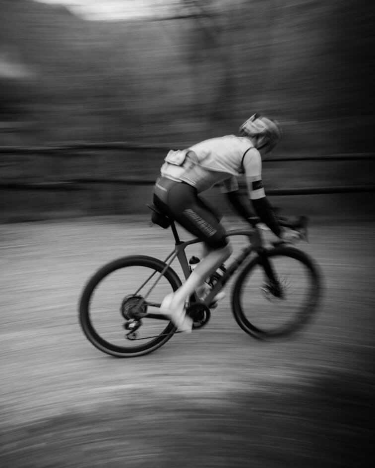 Cyclist riding at speed with motion blur