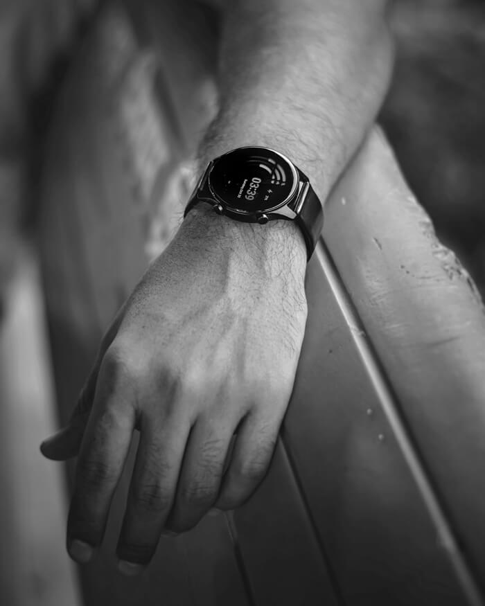 Close-up of a smartwatch on a runner's wrist